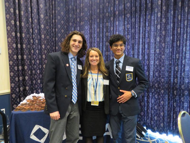 Gathered at the state conference are (l-r) Cape DECA President Andrew Racz, advisor Kristen Jones and Cape DECA Vice President Krish Prattipati.